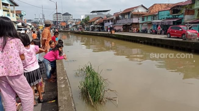 Sungai Jerambah Geledek yang menjadi lokasi mobil Avanza ditenggelamkan warga
