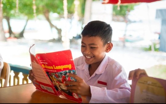Ilustrasi anak sekolah sedang membaca (Foto : Humas PTBA)