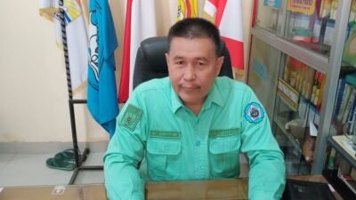 Kepala Sekolah SMP Negeri 31 Palembang, H. Taufik Hidayat