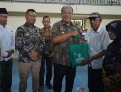 Pemkab Asahan Serahkan Bantuan Beras dan Paket Sembako Kepada 1000 Kaum Dhuafa