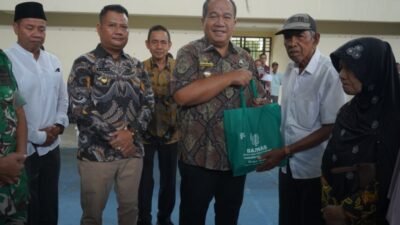 Pemkab Asahan Serahkan Bantuan Beras dan Paket Sembako Kepada 1000 Kaum Dhuafa